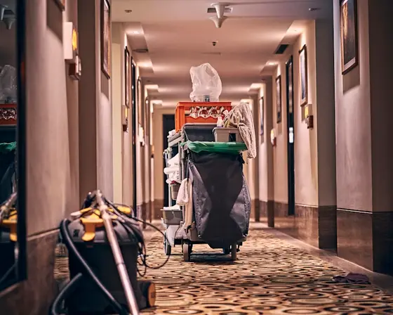 Housekeeping trolley in a hotel corridor.